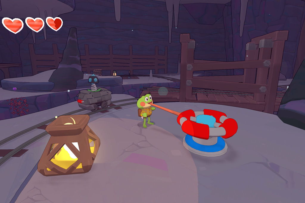 A green frog character using its tongue to interact with a mechanism in a cave level from the video game Big Hops by Luckshot Games, illustrating game culturalisation by 1Stop Translations.